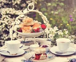 Trinity Tea Party: Scones, strawberries, and tea set outdoors