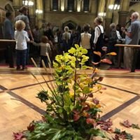Autumn floral arrangement at a harvest celebration event