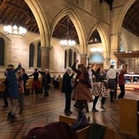 Rob and Margaret North's farewell: people dancing in a church hall.
