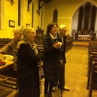 Rob and Margaret North bid farewell in a church setting.