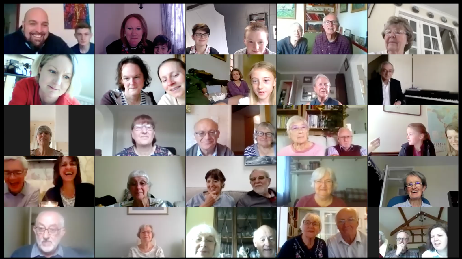 Screenshot of a Zoom video call showing around 25 participants in a grid for an online church gathering.