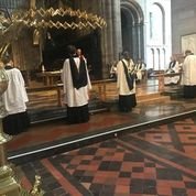 Clergy in robes during a church service, part of COVID-19 worship resources.