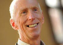 Close-up of a smiling older white man with thinning hair