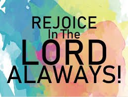 Rejoice in the Lord always! Inspirational quote on colorful background
