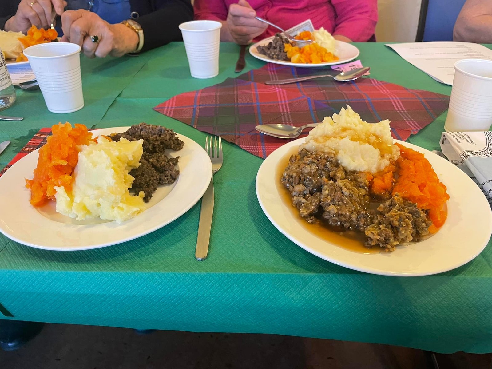 Plates of haggis, neeps and tatties served at a Burns Night supper.